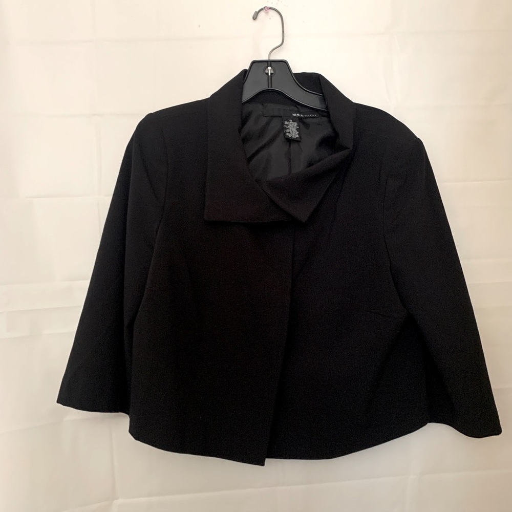 Beautiful three button,high cut black blazer, three-quarter sleeve size 12